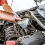 Fluid being poured into an engine