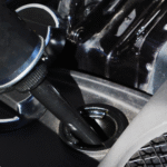 oil additive being added to an engine