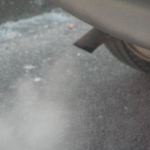 Car exhaust with visible fumes