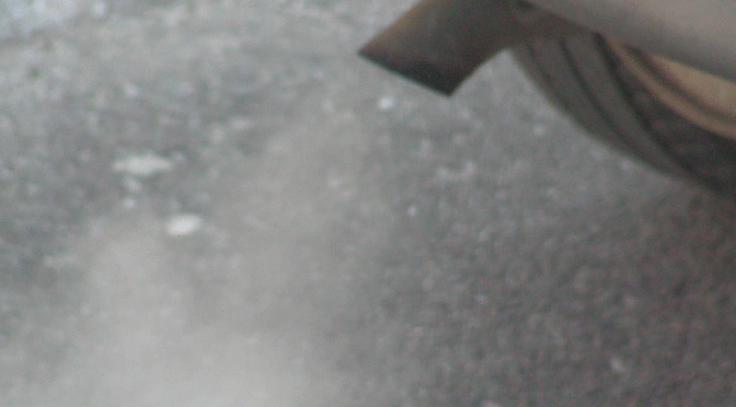 Car exhaust with visible fumes