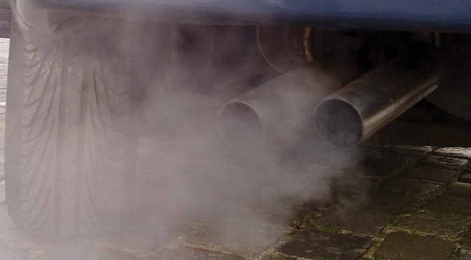 Car exhaust with visible fumes